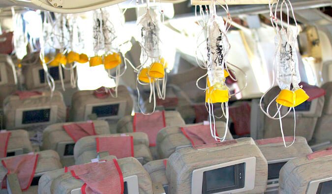 mtgreenee's tweet photo. I thought oxygen masks come out when planes suddenly nosedive 14,000 feet. 
Like in this picture. https://t.co/tA8aT8mDVj