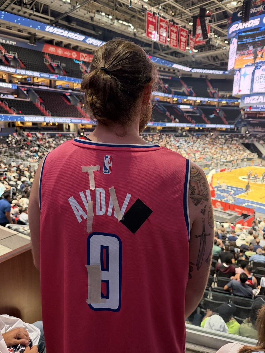 SleeperWizards's tweet photo. Just found a fan who has turned his Deni Avdija jersey into a DeAndre Ayton jersey 🔄

AND UNDER THAT he had on a Russell Westbrook turned AJ Dybantsa jersey 🤣💀 https://t.co/mKdXUL5AGF