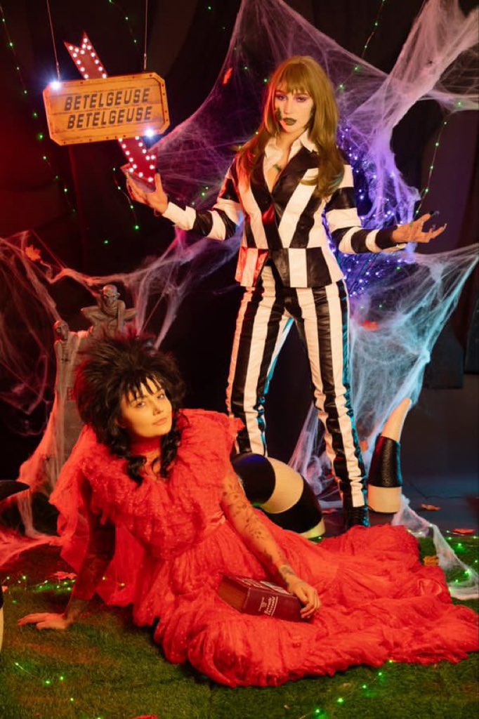kendraSundrdfs's tweet photo. IT’S SHOWTIME 🪲🧃🪦
Betelgeuse &amp; Lydia Deetz @adriaxxrae ⚰️📕
Beetlejuice (1988) 💚💜 

#kslibrarygirl #kendrasunderland #beetlejuice #halloween #costume https://t.co/ZPaT0yQdmL