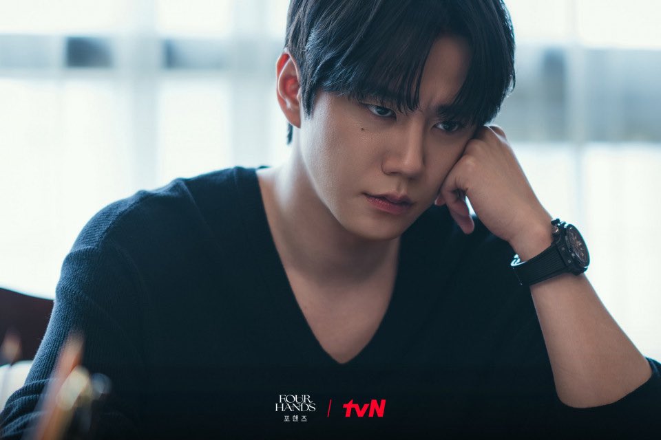 junyoungies's tweet photo. ㅡ #FourHandsTwoSonatas 

“Jeongyo was just a wolf who loved a sheep”… The writer reveals the ‘destined’ fate of Song Kang and Lee Junyoung. 

Reactions noting that Pio and Jeongyo's narrative is “more poignant than most romances” stem from how the emotional trajectory they experience mirrors the moments when real lovers fall in love and part ways. Growing up in different environments, the two friends forge a friendship through the medium of the piano, passing through stages of deeply cherishing while simultaneously keeping each other in check.

Writer Shin projected the image of “Heathcliff” a lone wolf roaming the wild onto Jeongyo, while wrapping Pio in the texture of “Catherine” as cold and cynical as an impenetrable wall. In Four Hands Two Sonatas, although Pio grew up in an affluent environment, his family was never once a comfortable presence, while Jeongyo had to force the only person who felt like family Pio out of his heart. In the end, because they were each other's sole refuge, an inseparable bond was inevitable.

“A starving wolf loves a sheep.” By instinct, a sheep is food for a wolf to satisfy its hunger, but the moment it falls in love with that sheep, the wolf falls into a contradiction between its desires and its love.

Jeongyo is no different. Although Pio sits at the end of the revenge that helped him endure the past nine years, the more he tries to tear Pio down, the more he faces the reality that he still deeply cares for him. Pio is both the target of his revenge and the person he refuses to lose.

The writer layered Jeongyo’s dilemma unable to harm him because he loves him, yet unable to let go because he hates him. With the image of the “starving wolf” deepening the narrative of revenge and a love-hate dynamic toward Pio.