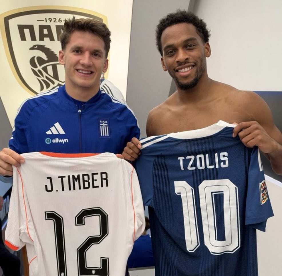 DailyAFC's tweet photo. Jurrien Timber and Christos Tzolis exchanging shirts. ❤️ https://t.co/FjSUDuB2rS