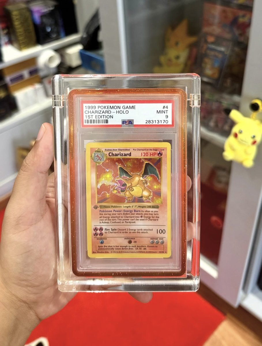 astro_degens's tweet photo. GIVING AWAY this $65,000 PSA 9 MINT 1999 Pokémon Base Set 1st Edition Charizard #4! 🔥🐉

If this card brings you even a fraction of the joy Pokémon has given me, then mission accomplished.

Valued at ~ $65,000 and it could be yours.

Just follow, like, RT & reply for a chance to win. Good luck! 🍀