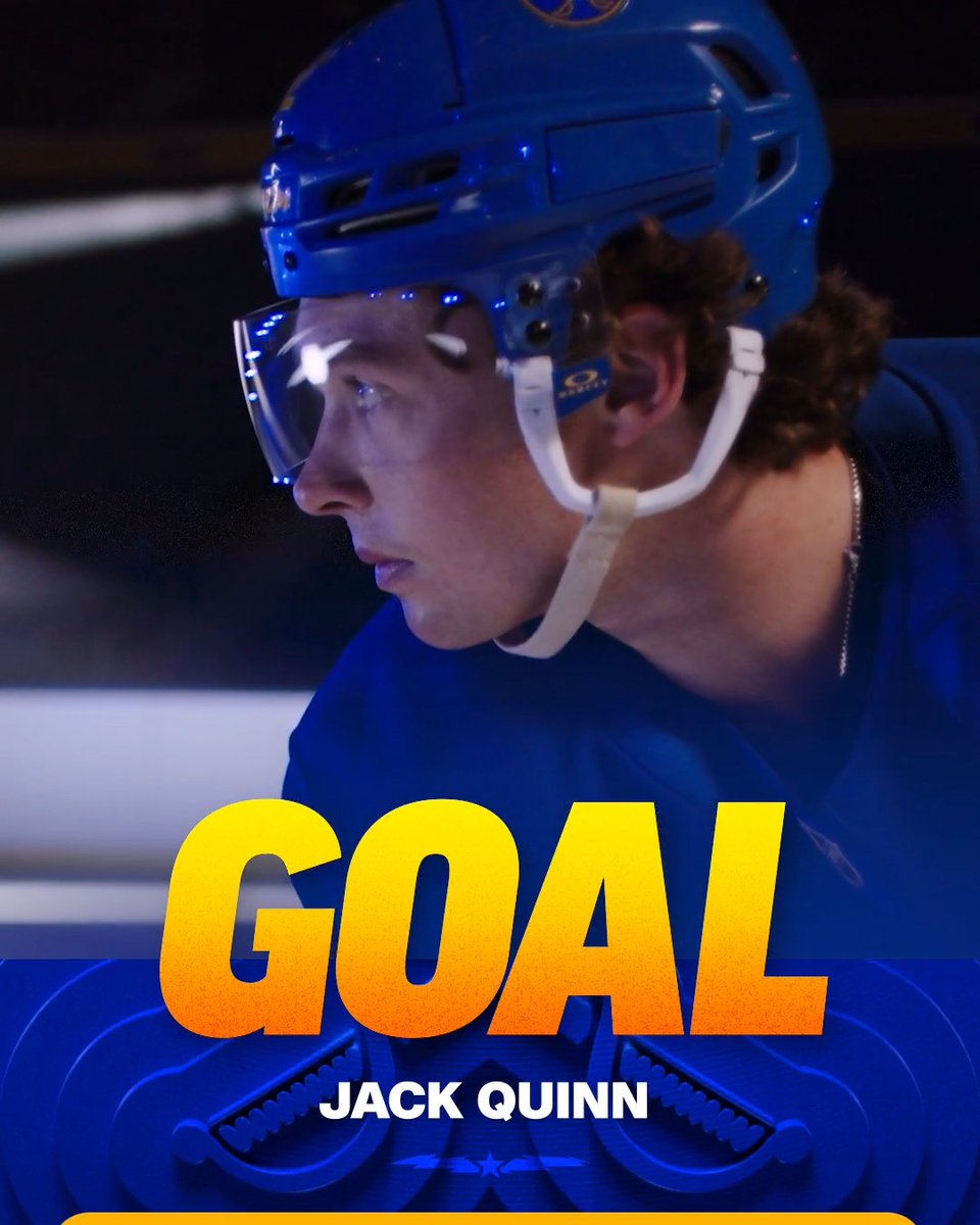 A close-up profile of Jack Quinn in a blue uniform and helmet with a clear visor, overlaid with bold yellow text reading "GOAL" and his name "JACK QUINN" beneath it. The post confirms Quinn scored to make it 3-2 for the Blue Jackets in the second period at 18:35.