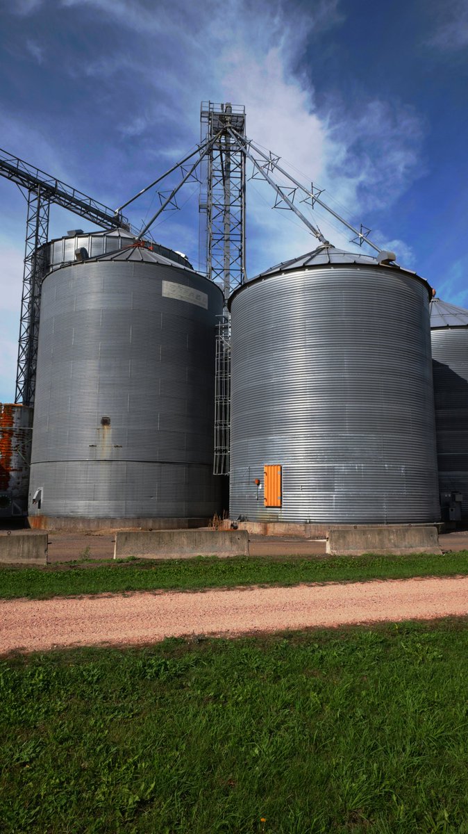 inTECHsity's tweet photo. In the midst of downtown churches and main street, I found it awesome to see these cool agricultural buildings.  Imagine the volume of harvests that have went though these over the years. https://t.co/LNYXFvc6Qh