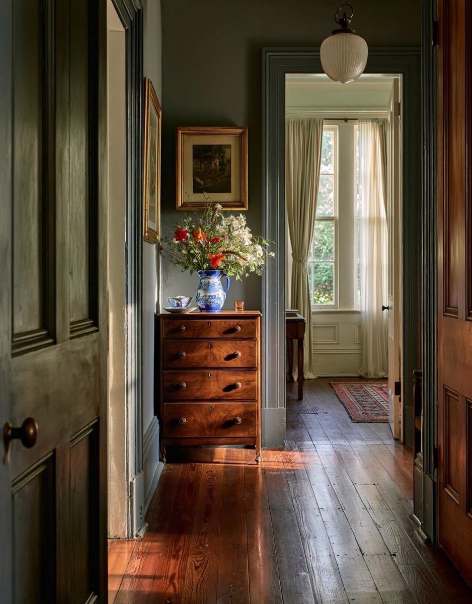 greenvibe's tweet photo. Old wood, quiet light, and flowers that make a hallway feel like a pause https://t.co/OB0TJVO3oA