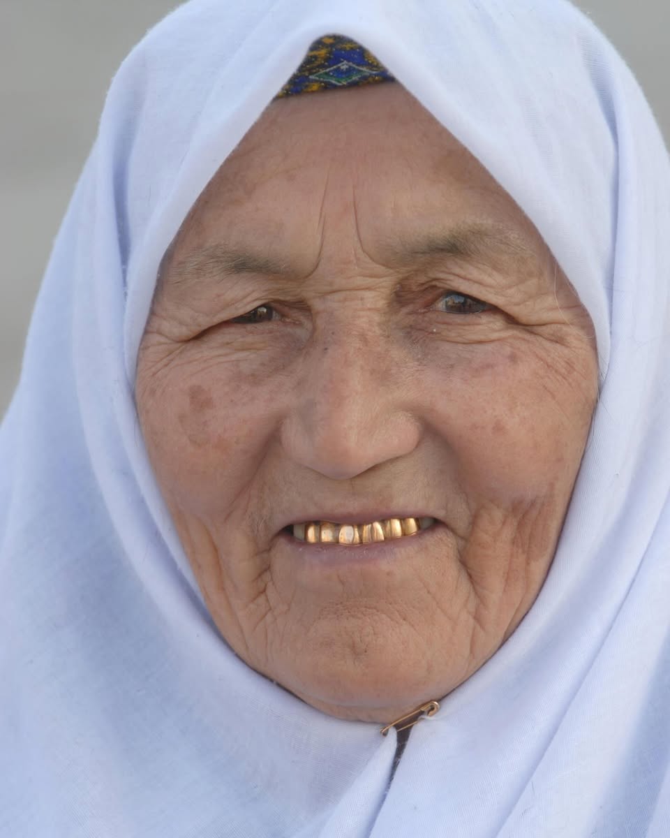 Complex's tweet photo. Every last one of these lowkey an album cover 📷

In Uzbekistan, gold teeth used to be a whole status symbol.  Women would swap their healthy teeth for gold as a symbol of status, beauty, & wealth. It’s not as big with younger generations now, but plenty of older women still rock slugs to this day.

[📷: via/ GettyImages]