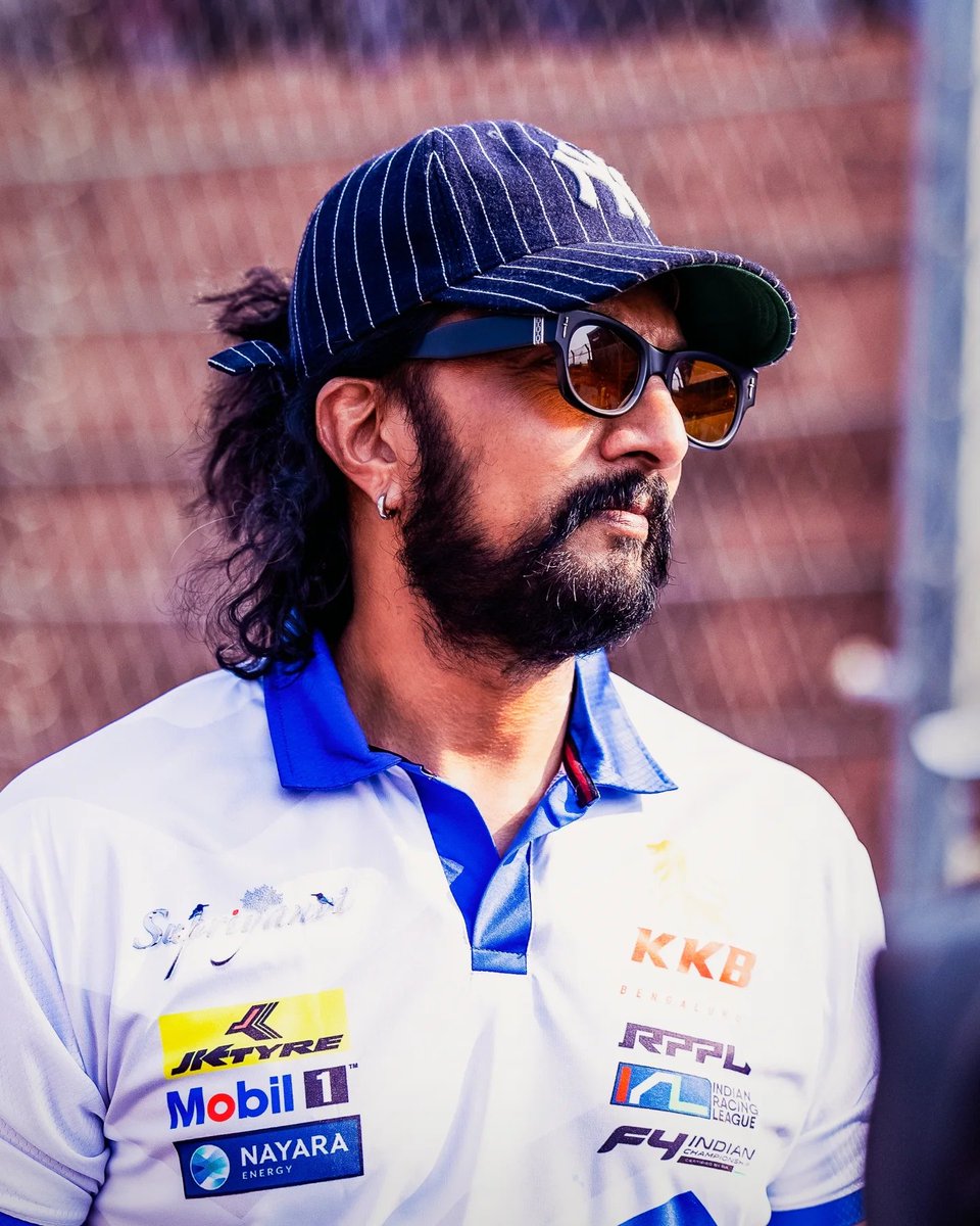 KicchaUniverse's tweet photo. The King in his element. 👑🔥

Style, swagger and that unmistakable Kiccha aura — @KicchaSudeep always commands the frame. 💙🏁

One Icon. One Legacy. Millions of Hearts. ❤️‍🔥

#KicchaSudeep #KicchaUniverse #KicchaBoss #AbhinayaChakravarthy https://t.co/mjIcommnek