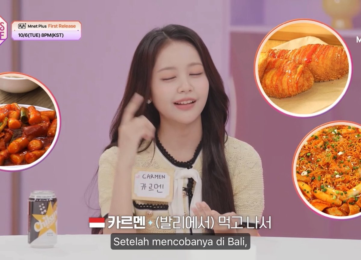 A scene from an Mnet Plus variety show featuring 'CARMEN' (from Indonesia) seated with a name tag, with food images shown in the corners and Indonesian subtitles 'Setelah mencobanya di Bali,' (After trying it in Bali).