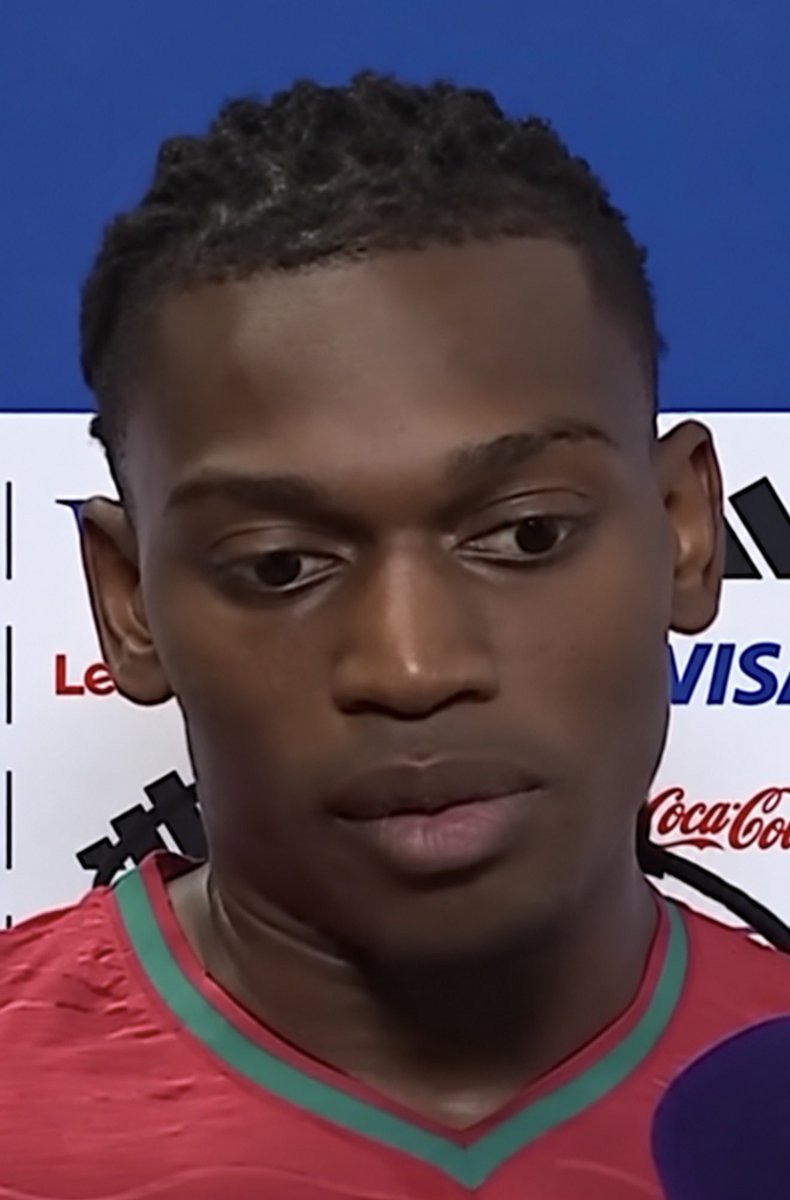 ChinoUTD's tweet photo. 🚨 Rafael Leao on Cristiano Ronaldo’s message after wearing Portugal’s No.7 against Denmark:

“Cristiano called me after the game.

I answered and he didn’t even say congratulations.

He said, ‘So… number seven.’

I laughed.

‘Here we go.’

He said, ‘No, Rafa. You chose this life now.’

I told him, ‘It’s just a number.’

He said, ‘Good. Keep telling yourself that.’

Then he asked me something strange.

‘Do you know what Figo did to me?’

I said, ‘What?’

‘He left me a problem.’

I started laughing.

Cristiano said, ‘I’m serious. Luis wore 7 before me. When I was young, that number already had a face. Figo. Portugal captain. Ballon d’Or. One of the best players in the world.’

Then he said:

‘That’s how 7 works. Somebody wears it well enough that the next person receives expectations with the shirt.’

I said, ‘So now you’re giving me your problem?’

‘Exactly.’

He sounded far too pleased with himself.

I told him, ‘Your problem is much bigger than Figo’s.’

He laughed.

‘That’s not my fault.’

Then he became serious.

‘Listen, Rafa. Don’t wear 7 and spend your time wondering whether people think you’re worthy of Cristiano Ronaldo’s number. You’ll drive yourself crazy.’

I asked him what I should think about instead.

He said:

‘Make sure when Portugal need their best player, 7 is somewhere in the conversation.’

That one stayed with me.

Because Cristiano wasn’t telling me to become him.

How could I?

I’m Rafael Leao. My football is different.

He was telling me that certain numbers eventually stop being numbers.

They become responsibilities.

If you wear 18 and have a quiet game, people discuss your performance.

Wear seven for Portugal after Luís Figo and Cristiano Ronaldo and suddenly people discuss whether you understand what you’re wearing.

Before we hung up, Cristiano said:

‘Next game, I want something from you.’

I said, ‘A goal?’

‘No.’

‘An assist?’

‘No.’

I asked, ‘Then what?’

He said:

‘Be the best player on the pitch.’

I laughed.

‘That’s easy for you to say.’

He said, ‘Of course. I wore 7 for twenty years. You think I’m going to lower the standards now because you’re my friend?’

Then he said something I’ll probably remember every time I put the shirt on.

‘Figo didn’t give me seven so I could protect what he’d done with it. And whatever happens next, I don’t want the next seven protecting what I did either.’

‘Add something.’

Then he paused.

‘Otherwise wear another number.’

That’s Cristiano.

Apparently I didn’t inherit his number.

I inherited his expectations.”