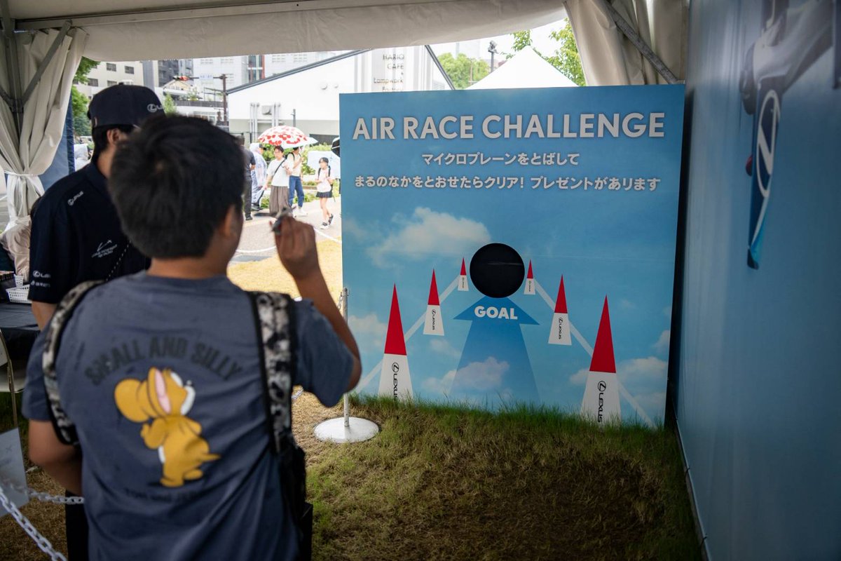 lexus_airracing's tweet photo. 久屋大通公園「ONE ASIA WORLD」の「LEXUS PATHFINDER AIR RACING 紹介ブース」は、
いよいよ最後の週末を迎えます。

アジア大会に集うアスリートへのエールとともにスタートした展示も、10/4(日)が最終日です。

特別仕様車「RZ600e "F SPORT Performance"」の展示や
各種キャンペーンにご参加いただいた方へオリジナルノベルティをご用意しております。
またブース内ではキッズコンテンツもご用意していますので、是非ご家族で足をお運びください。

「第20回アジア競技大会（2026/愛知・名古屋）」会期最後の週末は、ぜひ久屋大通公園へ足をお運びください。

#LEXUSPATHFINDERAIRRACING #LEXUS #室屋義秀  #アジア大会