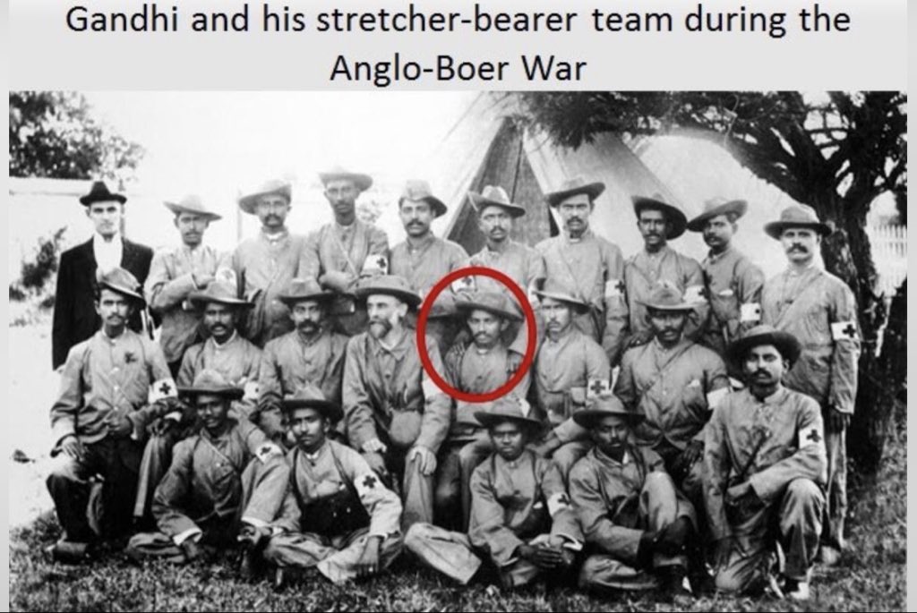 TonyTwitching's tweet photo. Mohandas K Gandhi was thrown off a train in South Africa in -1893
Despite this,
Gandhi stayed in South Africa for about "21 years"—until 1914—and why??

What did he do to survive foreign country for 21 years?

After the train incident, Gandhi joined  Second Boer War (1899–1902) and the Zulu Rebellion (1906) in South Africa as 

“Sergeant-Major” in British Army !!!