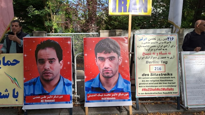 4FreedominIran's tweet photo. 3-#Berlin – October 1, 2026: On the 216th day of the sit-in, PMOI supporters condemned the mullahs’ regime’s continued brutal executions of protesters from the January 2026 uprising and demanded that the regime’s embassy in Germany be shut down. #StopExecutionsInIran https://t.co/v4zjYwzidR