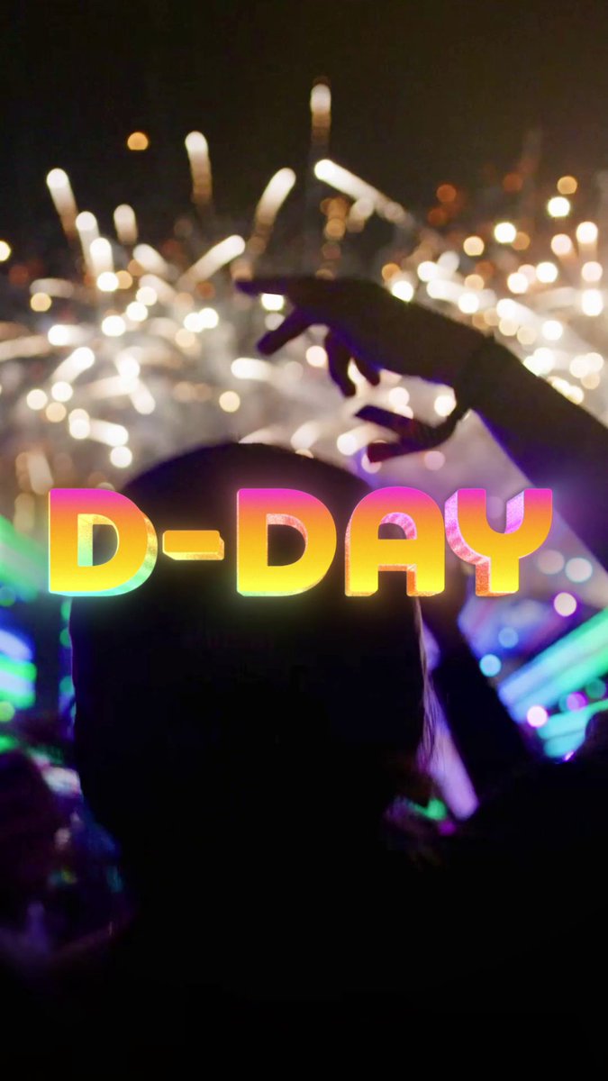 A silhouetted figure raises their hand against bright fireworks bursting in the night sky, with 'D-DAY' overlaid in a vibrant rainbow gradient.