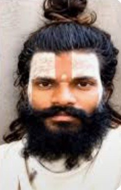thehumainty's tweet photo. Trigger warning: 

CCTV footage of the final moments of Rasik Dulari Sharan, a disciple of Premanand Maharaj, has surfaced. The roughly 30-second clip shows him resting on a surface before jumping from the fourth floor of an ashram in Mathura, Uttar Pradesh.
Towards the end of the footage, another disciple could be seen casually walking in the frame.
SSP Shlok Kumar has said investigators are awaiting forensic analysis of the deceased’s mobile phone and the blood toxicology report before ruling out foul play. The inquiry is also examining why he inflicted a severe injury on his private parts before the fall.