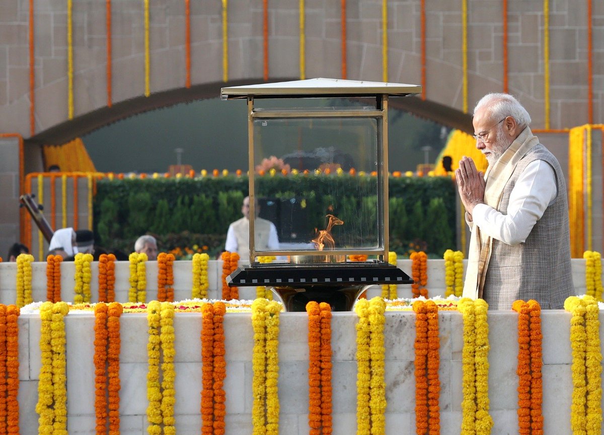 narendramodi's tweet photo. Paid homage to Mahatma Gandhi at Rajghat and former Prime Minister Lal Bahadur Shastri Ji at Vijay Ghat.

Their lives of simplicity, courage and service to the nation continue to inspire generations. 

Their ideals and unwavering commitment to India's progress will always remain a guiding light for us.
