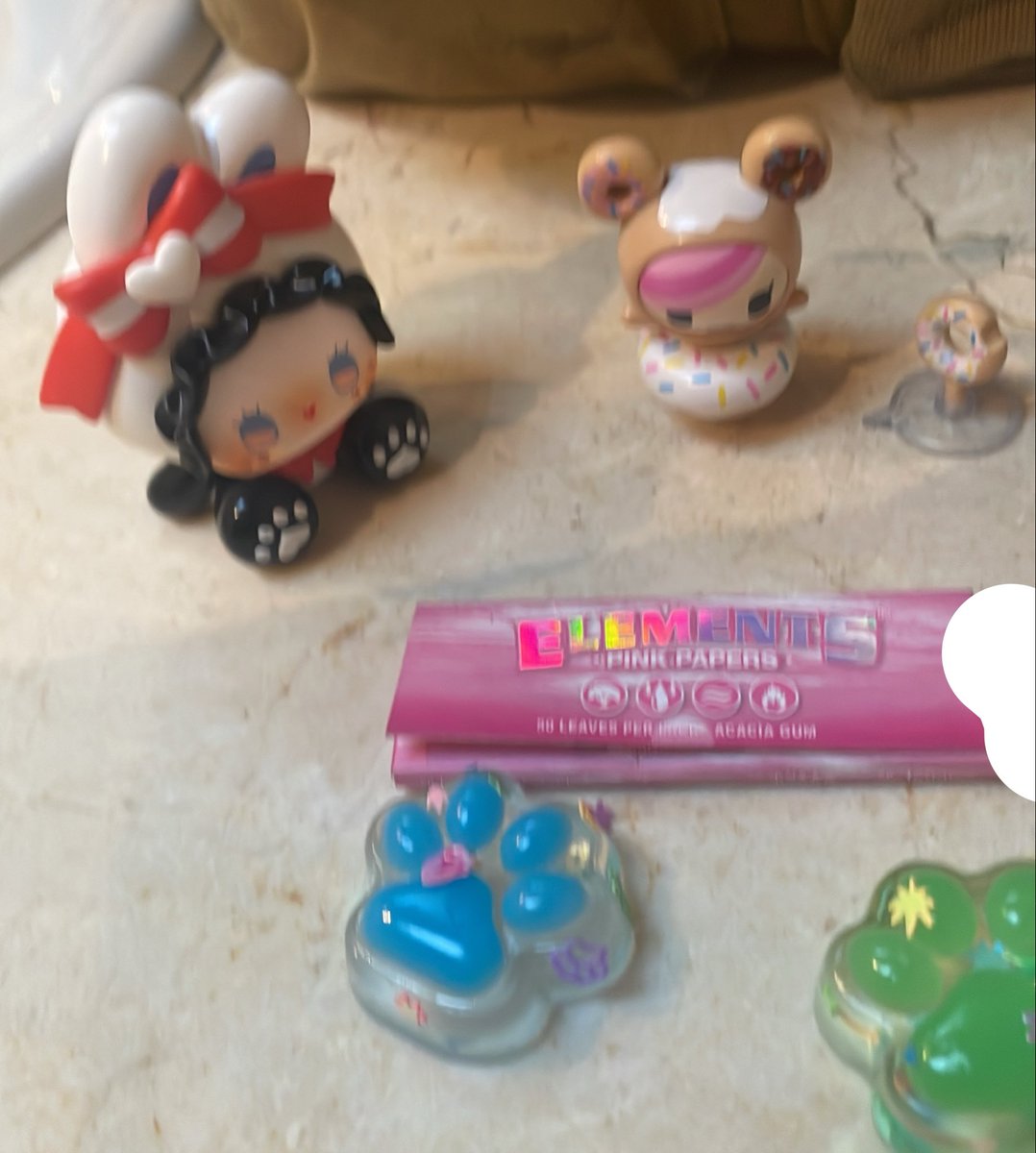 aooci18's tweet photo. Bought some cheap blind boxes from the toy store just to get excited for something. And Pink rolling papers https://t.co/NkDsmAKGTQ