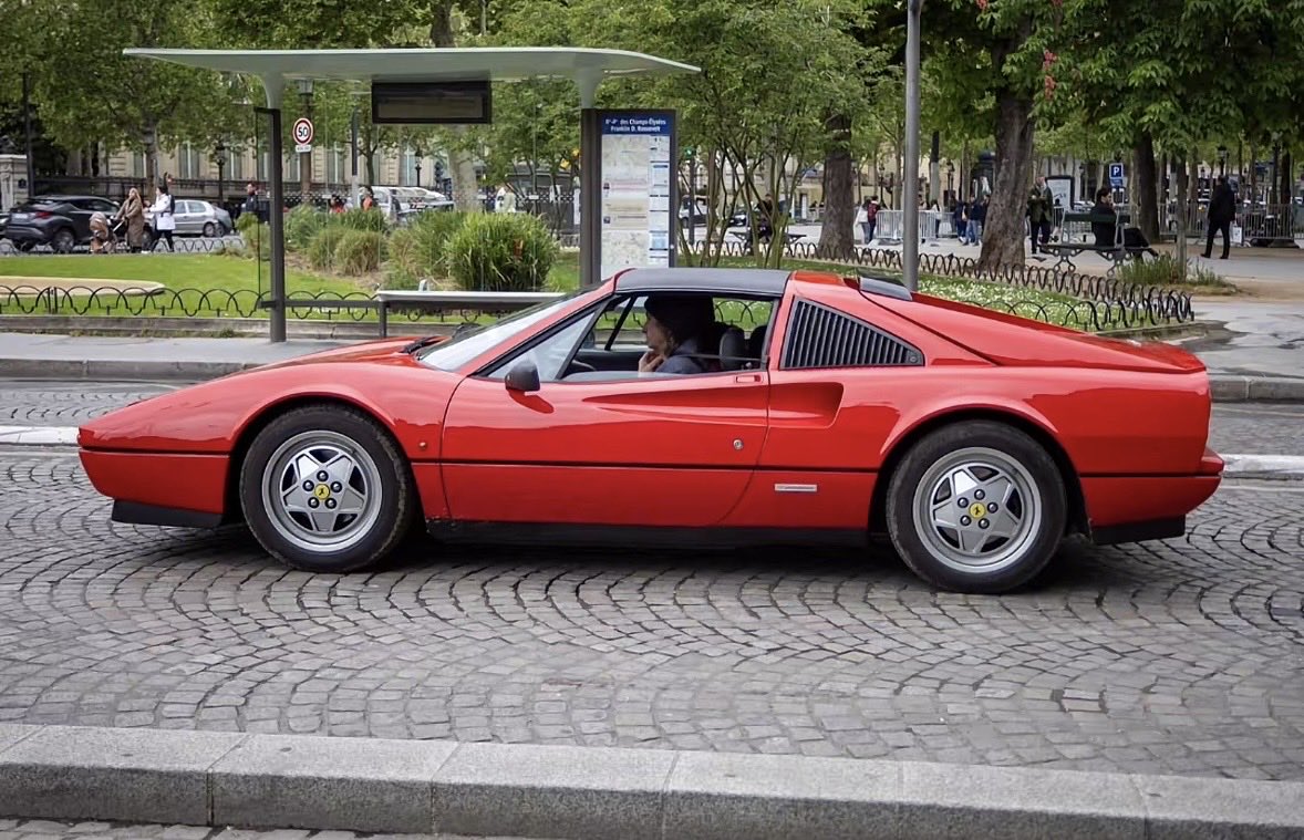 Meraki_Yu's tweet photo. Was doomscrolling on TikTok and came across a video of Lisa with a Ferrari for her new clothing collaboration with Von Dutch and I realized that it doesn't look like her Testarossa so im here wondering if its her new car Ferrari 328 GTS If it is well damn true car collector https://t.co/9EhWbaozUo