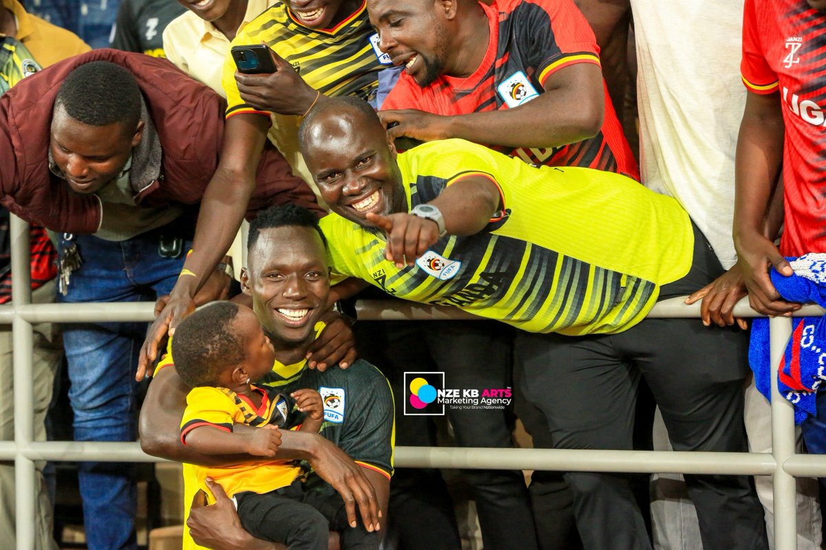 Nzekbarts's tweet photo. @denis_omedi24 reconnects with his former Big League coach at Boma FC, Alinaitwe Fred, popularly known as Kajambiya, during the Uganda Cranes game.

From the Big League days at Boma FC to meeting again on a big national stage  football truly creates lasting bonds. 

#AFCON2027 https://t.co/cLMQhJe52m
