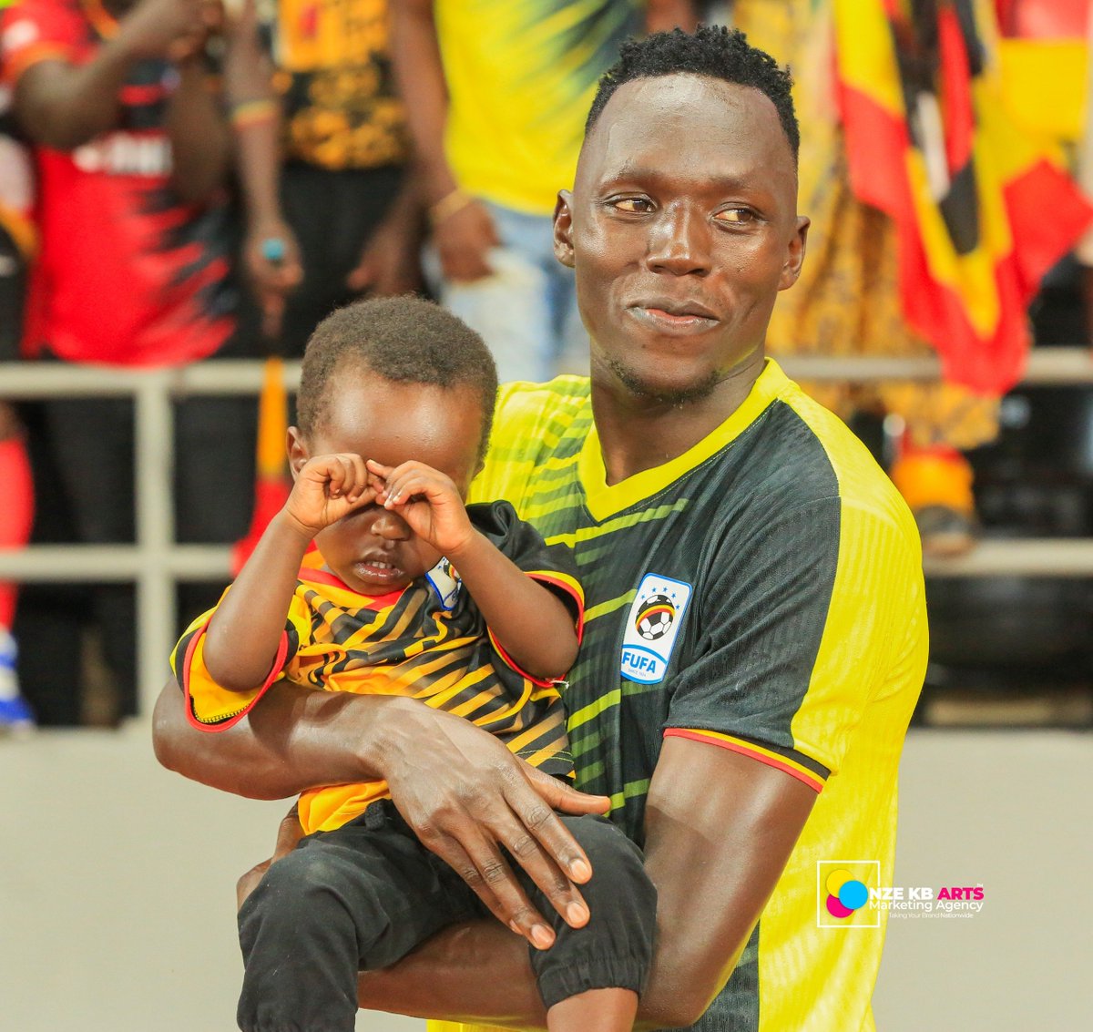 Nzekbarts's tweet photo. @denis_omedi24 reconnects with his former Big League coach at Boma FC, Alinaitwe Fred, popularly known as Kajambiya, during the Uganda Cranes game.

From the Big League days at Boma FC to meeting again on a big national stage  football truly creates lasting bonds. 

#AFCON2027 https://t.co/cLMQhJe52m