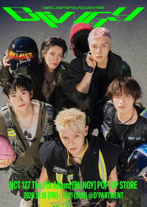 A promotional poster for NCT 127's 7th album "BLINGY" pop-up store titled "NEO LOST&FOUND CENTER" features six members posing in edgy, racing-inspired outfits with helmets and tactical gear, with event details displayed in bold green text announcing the Tokyo event running from October 16 (Fri) to October 26 (Sun) at D'PARTMENT.