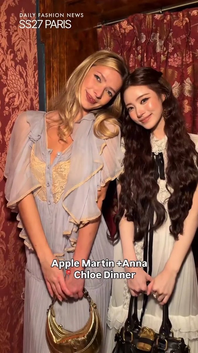 The image shows Apple Martin and Anna at a Chloe dinner event during Paris Fashion Week SS27, with text overlays reading "DAILY FASHION NEWS SS27 PARIS" and "Apple Martin + Anna Chloe Dinner." It depicts the two women posing together in elegant dresses, matching the post's caption about Anna being pictured with Apple Martin.