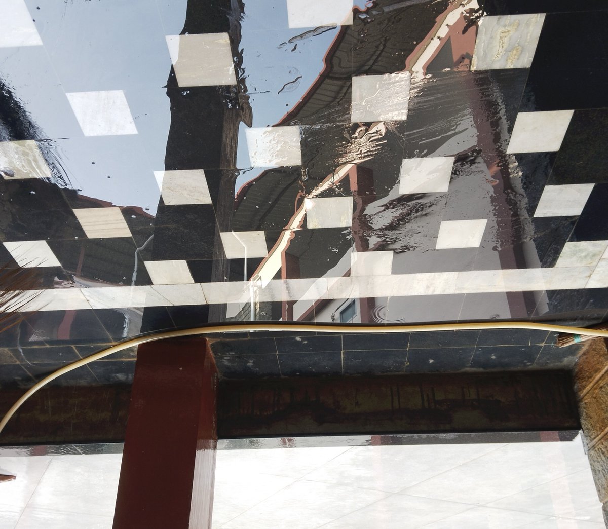Sup_Varshini's tweet photo. @Justtdavid_ The water on tile because our college building is under reno, we had inauguration today so they washed, also our last year and watching the reflection made me feel kind of melancholy and nostalgic already so clicked randomly then after looking at it again I had this perspective https://t.co/E4ibtKwjXJ