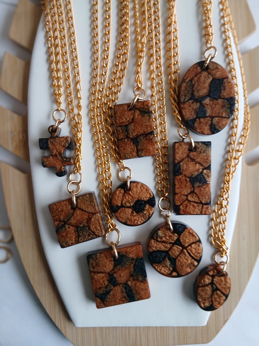 Kanjoor0's tweet photo. @QhuwaKrafts @WanjiruOfQ COLECTIBLES 3
Molten Copper Pendants
From 1,000 to;
Moja KES.850
Mbili KES.1,500
Tatu KES.2,000

(Pick &amp; Pay ready as on image)

All discounts for these or orders made for these, run from 2nd Oct-10th Oct 2026 

+254751610909 (Airtel Money+Enquiries) 

https://t.co/6qqPDuJxCQ https://t.co/f92RETucf1