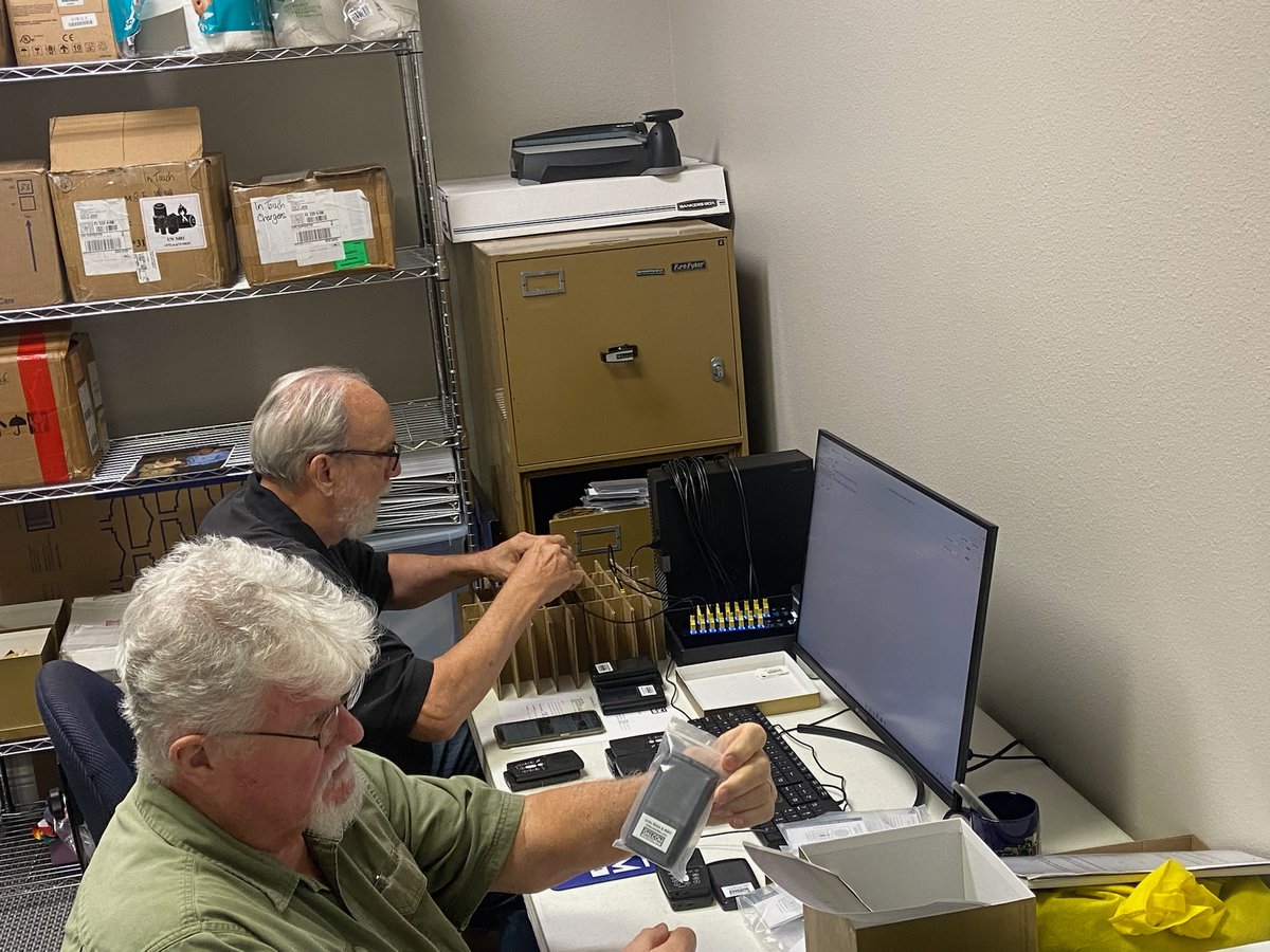 GalcomUSA's tweet photo. These key volunteers are loading solar charged audio Scripture players in 2 languages for mission partners in West Asia today. Pls pray these get to just the right people there this month! #GalcomUSA #solarBibles #missions #audioBible #reachingthelost https://t.co/7mHA0Gq3ns