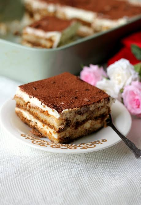 antartictazy's tweet photo. "I am taste testing my first batch of tiramisu and not gonna lie it tastes like the one I ate in Naples..."

*looks around and sees another 5 pans of tiramisu*

"...apparently I made more of it." https://t.co/IdrBuZk6Kt