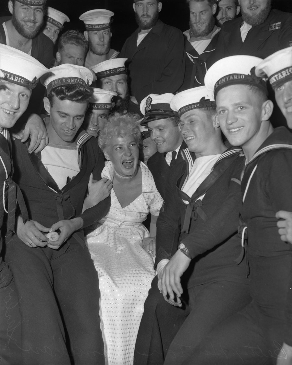 ReadyAyeReady's tweet photo. Actress Betty Hutton with Canadian sailors on board HMCS Ontario, 1949. Photo: Los Angeles Daily News, Wikimedia Commons #RCN https://t.co/b8SVf7k7tK