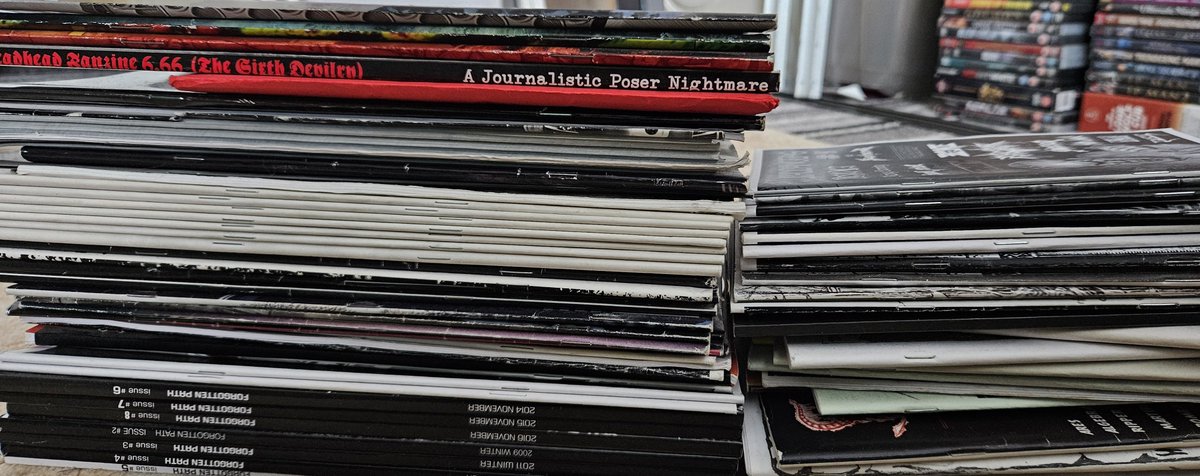 MrLeeDragon's tweet photo. Just dug out a stack of Metal 'zines.
Completely forgot I still had these.
They range from yer standard b&w copied pages, to full on pro-looking stuff. 🤟💀
 All focus on the underground extreme metal scene.

These are for sale, but can't see me bothering to eBay list 'em. Is anyone even interested in fanzines anymore?