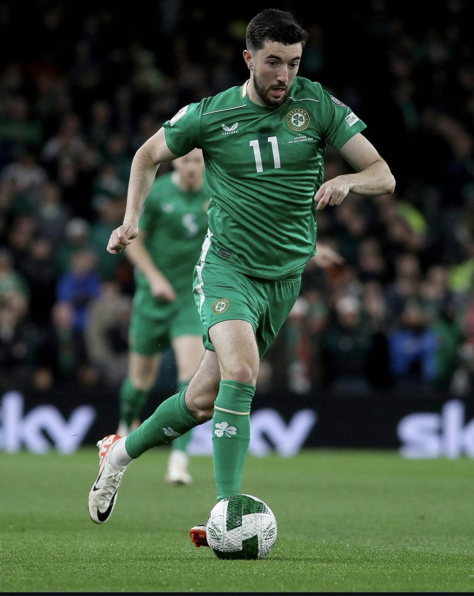 IFBMedia's tweet photo. Finn Azaz💚

Finn could have played for England, Israel or Ireland. He chose Ireland. "It was always Ireland."

Don’t let anyone try to argue and tell you otherwise!

His father Tim grew up in Cork, and Finn came visited Ireland often as a child. His great uncle is Brian Murphy, the Cork dual star who won All-Irelands in hurling and football.

Growing up in Birmingham, Finn was as sharp off the pitch as on it. Nine A*s at GCSE at King Edward's School, then A-Levels in French and Business while a scholar at West Brom. He even kept studying French and Spanish afterwards, just for his own personal development.

On loan at Plymouth, he quietly volunteered once a week at St Luke's Hospice. After he left the staff 
spoke, describing him as having "a heart of pure gold." He gave patients VIP treatment and walked one young fan onto the pitch as a mascot.

That's who Finn is. Yet there’s always been this uncomfortable criticism of Finn which has been amplified in recent weeks.  

He’s been treated like something else entirely. Not because of anything he did. Because of who his family is.

His loyalty doubted, his heritage thrown at him like an accusation. Some of it from people who should know better, including a former Ireland centurion.

Heimir described him recently as one of "the people I admire the most in all of this." Then on Thursday he stood up again. 

Against Austria, he had more touches than any other Ireland player. Starting deeper alongside Coventry, he was exceptional, driving us forward with the kind of passing we've been crying out for in that position. His cross-field ball helped create the penalty for our second goal.

He was later pushed further forward into the #10 role, where he he’s most effective at club level.
His influence on the game faded with the switch. 

With Ireland he’s more effective deeper, in attacking midfield Ireland need a more “direct energy” which doesn’t suit him. But he can give us the control and quality on the ball we've lacked from deep.

Whatever your view on the wider debate, no player should be made to feel unwelcome in the green jersey because of his family.

Finn chose us. Now it's our turn to back him💚