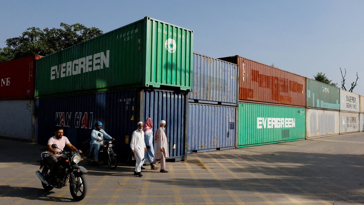 MarioNawfal's tweet photo. 🇵🇰 PAKISTAN'S attempt to keep IMRAN KHAN SUPPORTERS out of Islamabad is now clogging the COUNTRY'S BIGGEST PORT 1,400 kilometres away

For weeks, authorities have been seizing trucks and shipping containers to build barricades ahead of PTI's march on the capital.

Transporters say more than 2,000 vehicles were requisitioned in September alone.

Some were still carrying cargo.

Now truckers are simply refusing to drive north. One said

“Right now, going towards Punjab is like committing suicide”

The result is a growing pile-up of containers in Karachi and disruption to freight heading toward Islamabad, Rawalpindi, Peshawar and other northern cities.

And the economics get ugly quickly!!

Transporters say a seized container can accumulate 30,000 to 40,000 RUPEES in demurrage charges EVERY DAY, while the truck sits idle and deliveries go unfinished.

Some containers are filled with sand and welded together before being placed across roads into Islamabad.

So the effort to stop PTI supporters reaching the capital is beginning to produce a rather unusual second-order effect:

Pakistan's political blockade is turning into a logistics blockade.

Source: Reuters, Sky News / Writer: Oliver