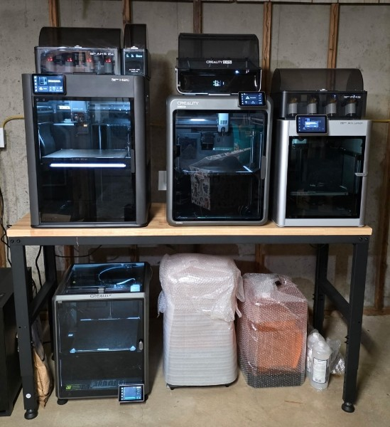 DaPoets's tweet photo. The electrician has us wired up now. Can't wait to make this 3D Printing area a real workspace! (The wrapped ones are a resin printer &amp; wash) https://t.co/NrxUd2bBQ9