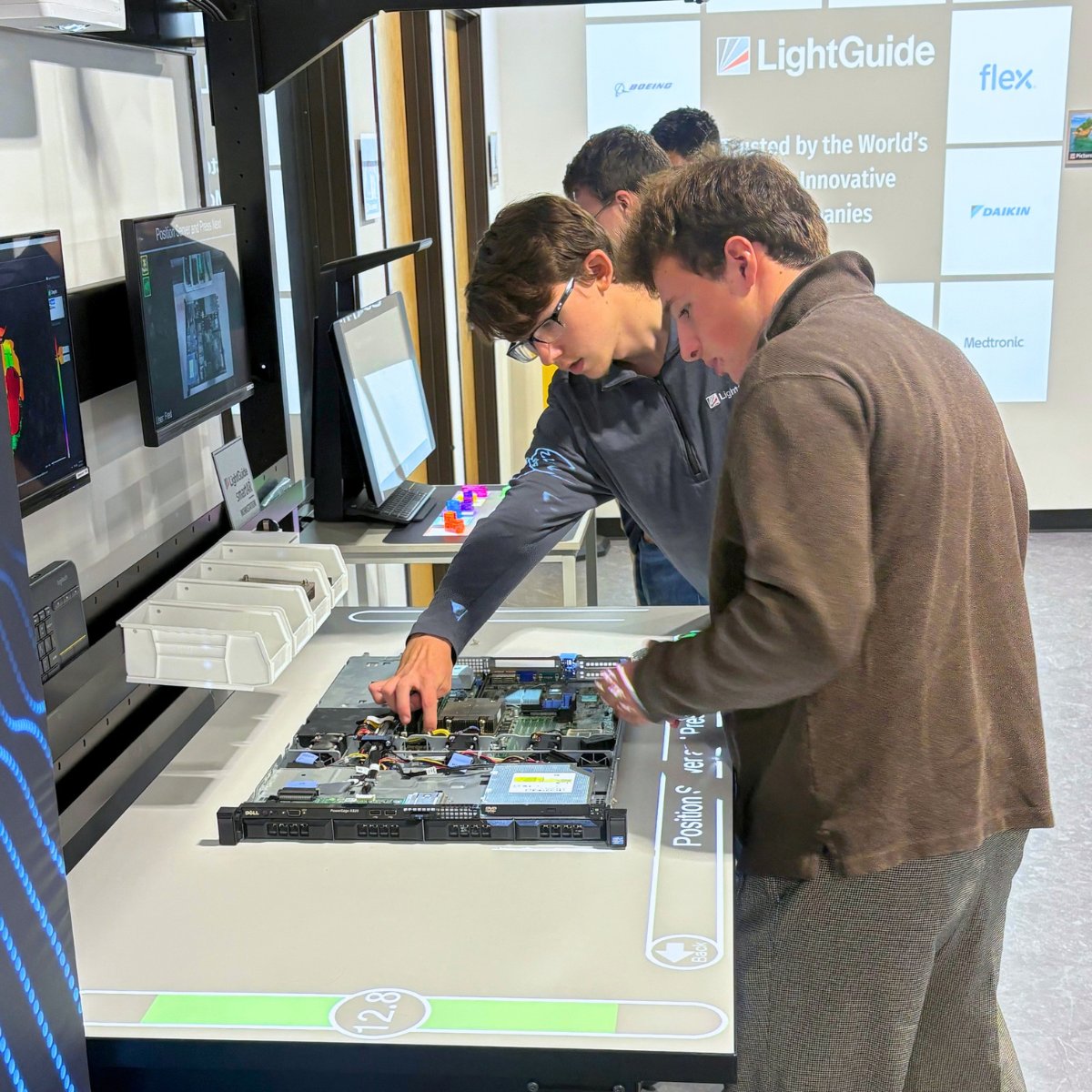 LightGuideInc's tweet photo. The future of manufacturing starts with today's students. In celebration of @MFGDay, local Career &amp; Technical Education students visited our Innovation Center for hands-on experience with augmented intelligence and other technologies transforming factory floors. #MFGDay26 https://t.co/tcyEFbxW28