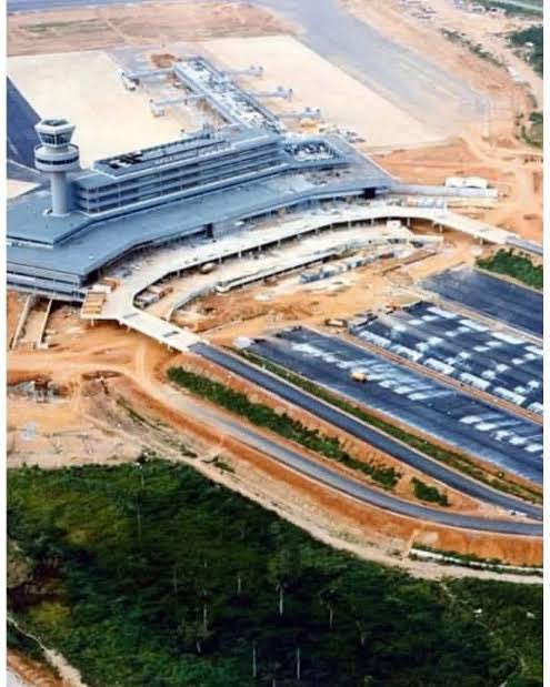 nwoko_greg62705's tweet photo. The international terminal of Murtala Muhammed Airport, Ikeja, was deliberately modeled after Amsterdam Airport Schiphol.

Lagos did not expand as planned.

History: The original Lagos Airport was built during World War II and was the base for West African Airways Corporation from 1947. 

In the early 1970s, Gowon's government decided to build a new international terminal as part of a master plan to handle traffic up to the year 2000.

The contract was awarded at a cost of 240 million Naira. 

Construction ran through the mid 1970s. It was renamed after Murtala Muhammed after his assassination in 1976, while still under construction.

The new terminal was officially opened on March 15, 1979 by General Olusegun Obasanjo. 

At the opening, it was announced that it was modeled after Schiphol and was designed to handle 2.5 million passengers a year and 25 international airlines, with a 3,900 metre runway and its own 10,000 kilowatt power plant.

The idea was that Lagos would become a hub like Amsterdam. 

A huge land area, almost the size of a local government, was acquired at Ikeja for this. The design was for several wings to be added later, just like Schiphol.

Schiphol grew to become the 5th busiest in Europe with 58 million passengers. Lagos did not expand as planned. That is why people still say MMIA is a small copy of Schiphol that was never completed.

First photo: Schiphol Airport
Second Airport: Lagos International Airport under construction during the Gowon Government (Before it was renamed Murtala Muhammed International Airport)

How many times has Schiphol and Murtala Muhammed airport gone through expansion?

Schiphol has been expanded in major waves, not just once, since it started as a military mud field in 1916.

If you count the big rebuilds:

1. 1949 - First proper passenger terminal after World War II bombing. Decision to make Schiphol the main airport of Netherlands. The village of Rijk was demolished to expand.

2. 1967 - The famous single terminal that Lagos copied. Opened by Queen Juliana. This is the core that is still in use today as Departure Halls 1 and 2. Designed for jet age.

3. 1970 - A Pier, now C Pier, modified to take the Boeing 747.

4. 1975 to 1977 - New pier D, now F Pier, built for wide body jets. Oil crisis stopped some work in 1973.

5. 1978 - First underground railway station added, so airport connected to train.

6. 1991 to 1997 - Schiphol Plaza and air traffic control tower. The 1967 terminal pulled down partly to build Plaza shopping centre.

7. 2003 - Fifth runway, the Polderbaan. Plan for it started since 1970 but parliament only approved in 1995. Cost 340 million euros. Also Departure Lounge 1 renovated in 2005.

8. 2016 to 2024 - New Pier A and new terminal construction started, to add 14 million passengers capacity per year. Meant to be ready by 2023 but delayed.

9. 2025 - Royal Schiphol Group announced a 10 billion euro investment plan for next expansion, new brand and sustainability rebuild.

So from 1949 to now, at least 8 major expansion phases. The airport went from 4 runways in 1940 to 6 runways today, from one small 1949 building to one single terminal with 3 departure halls, and from thousands of passengers to 71.7 million in 2019.

Lagos Murtala Muhammed International, which copied the 1967 design in 1979, has had only 2 real expansions since then: MMA2 domestic in 2007 and the Chinese funded international E Wing in 2022, while Schiphol has had 8.

That is why Schiphol became 5th busiest in Europe and Lagos is still struggling with 6 million passengers.