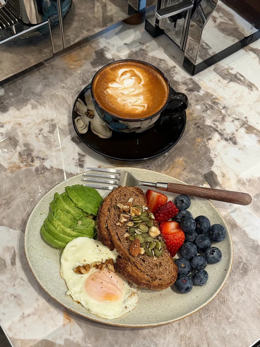 AliceFoster37_'s tweet photo. I was really impressed with my breakfast today. I took the time to carefully slice the avocado and even tried to make a latte art design (even though I did my best). https://t.co/0JbMLRq20Y