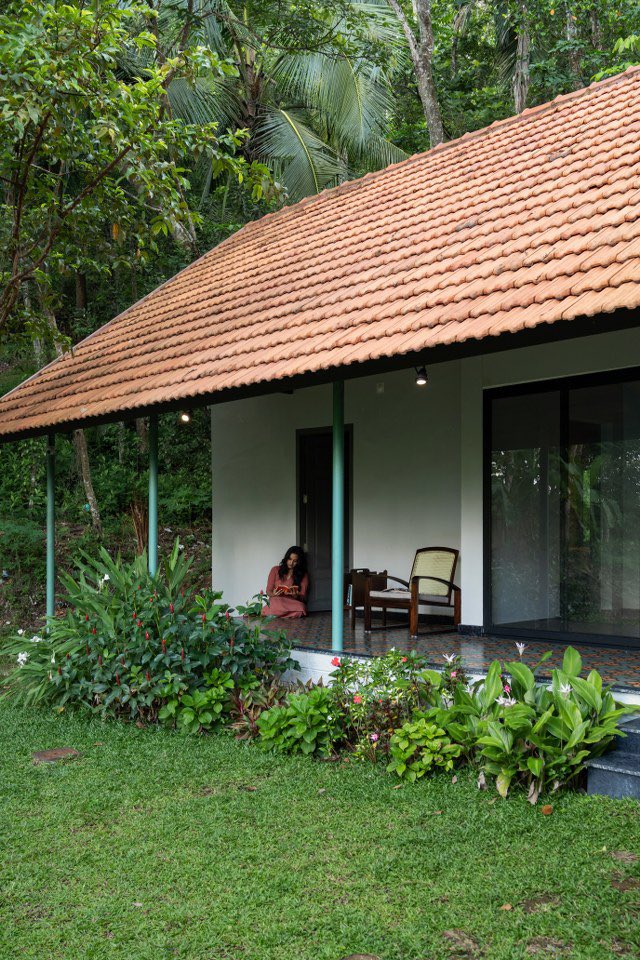 shavnyuyngah's tweet photo. Ark Architecture Studio inherited an abandoned house with damaged walls, left to the forces of nature. They didn't tear it down. They kept the bones and changed only what the house needed.

The metal sheet roof became a sloping roof extended over a pillared verandah. The walls dividing the living, dining, and kitchen areas came down, so light and air now move through what was once a dark, moody home. Large openings in every room pull the surrounding greenery inside. Terracotta, cane, and fabric keep the palette earthy, and most of the furniture was refurbished and reused.

That is material intelligence: using what the land and the culture already know. Terracotta, cane, and the verandah are not trends. They are old answers to heat, rain, and light, which is why the house feels timeless instead of fashionable. Nothing here was chasing a look, so nothing here will date.

But the lesson is not to copy it. A Kerala verandah answers Kerala's climate. Paste it into Bamenda or Lagos and we repeat the imported glass box mistake, just with a prettier reference.

The lesson is the method. Read your climate, your materials, and your own building traditions, then let the design come from those. Designing for our climate means something, and it has to be ours.

Ark Architecture Studio. Ekam Retreat, Amboori, Trivandrum, Kerala. 2023. Principal designers: Ar. Rahul Kumar and Ar. Malavika Mahesh. Photography: Nathan.