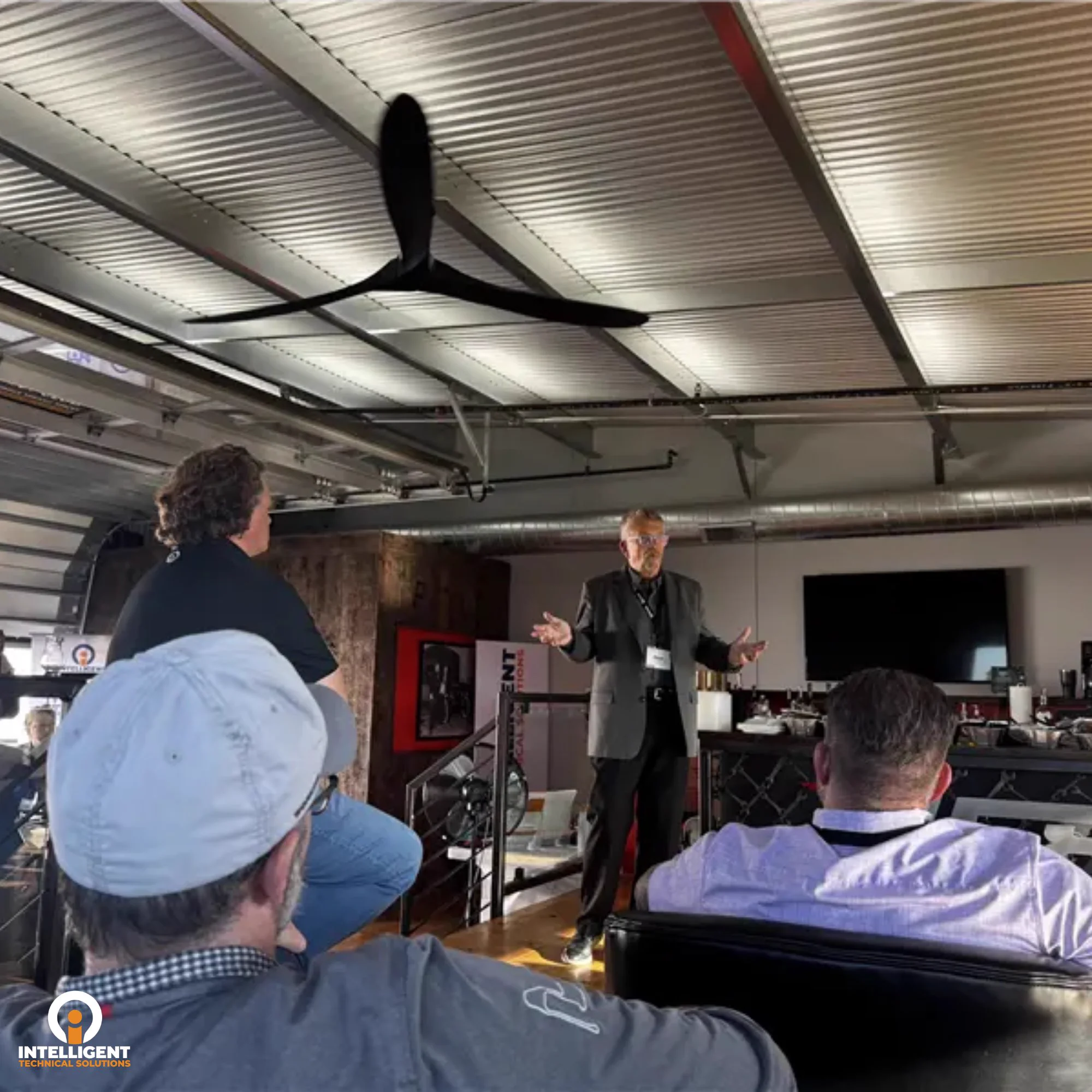 Speaker addresses Detroit business leaders about cybersecurity and technology during the ITS Full Throttle event.