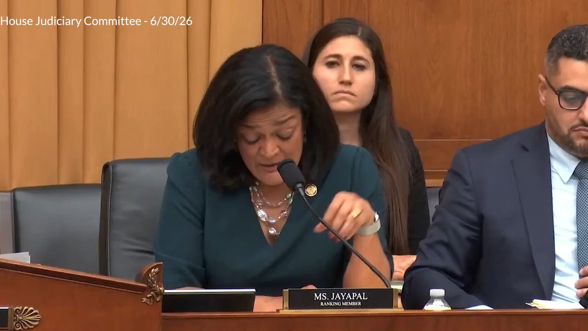 A congressional hearing shows Representative Pramila Jayapal (identified by her nameplate "MS. JAYAPAL - RANKING MEMBER") speaking into a microphone with her head bowed downward during a House Judiciary Committee session on 6/30/26. The accompanying post's claim of Democrats' indifference is contradicted by the image, which actually shows Jayapal actively speaking rather than displaying disinterest, illustrating how misleading captions can be paired with unrelated imagery.