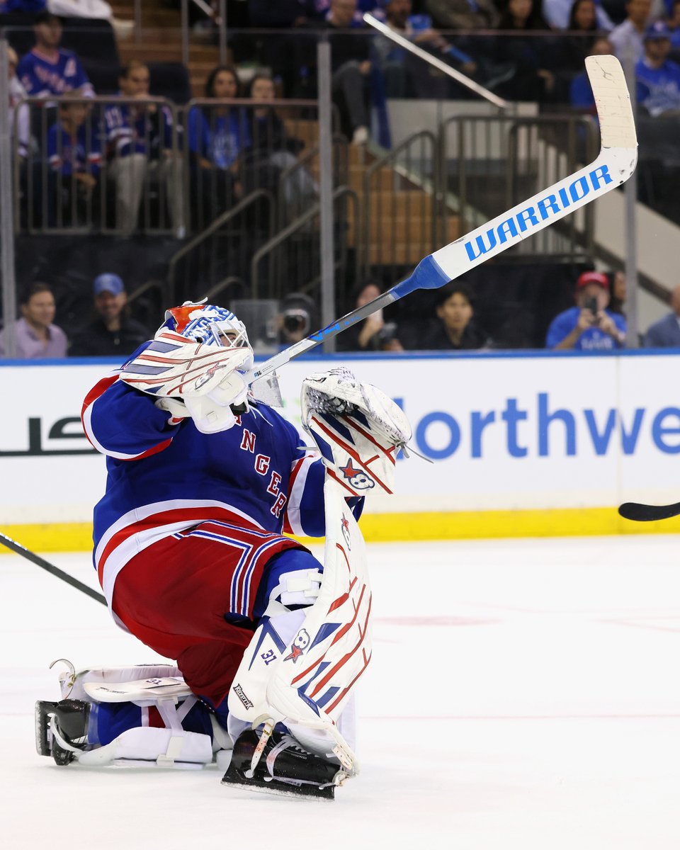 NHL's tweet photo. Remember when Igor Shesterkin scored a goalie goal last night?! 🚨

Let's relive it in photos 📸 https://t.co/rjG5OhIpFI