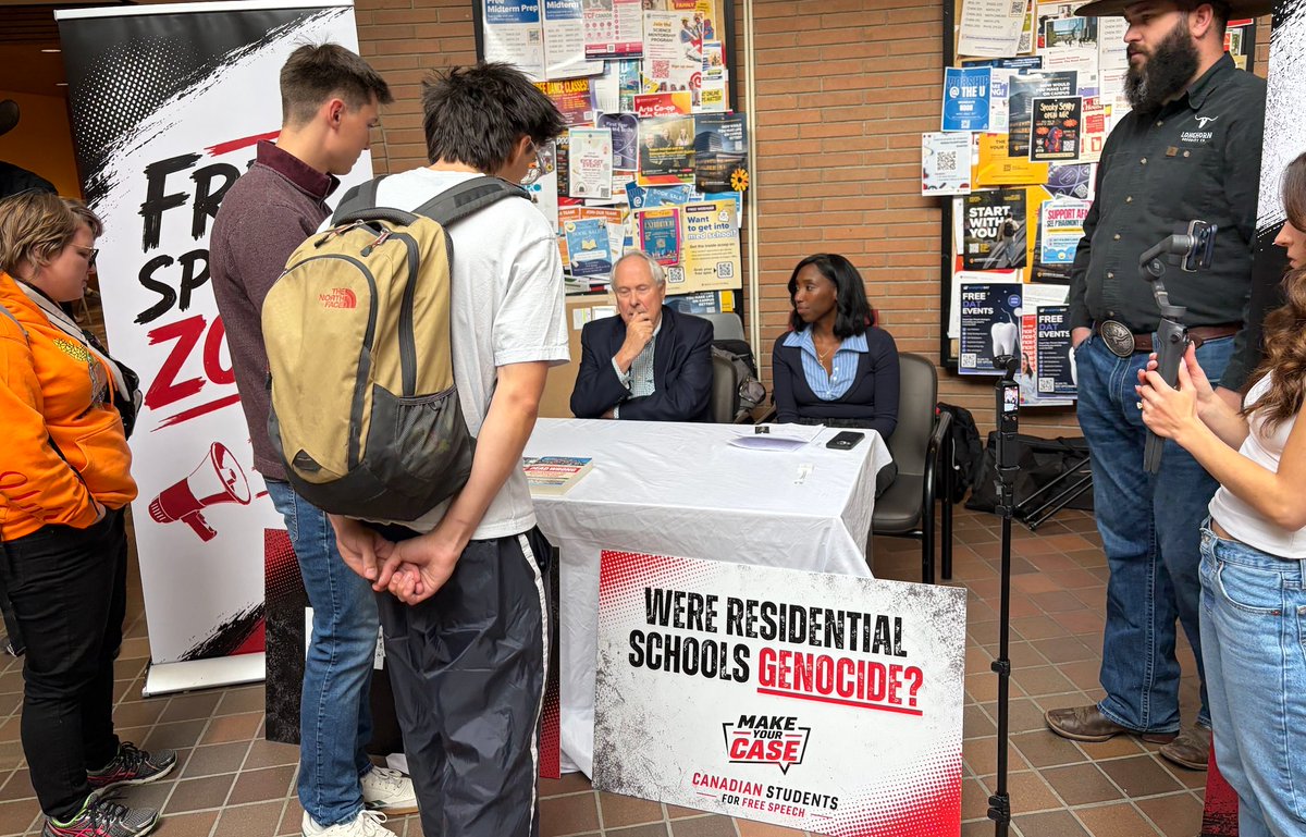 TDF_Can's tweet photo. Introducing "Make Your Case," a new campus debate series from Canadian Students for Free Speech (@FreeSpeech_CAN).

The format is simple: a speaker sits at a table in an open campus space and invites any student who disagrees to grab the mic and argue their side.

Our first stop was the University of Calgary, where Dr. Tom Flanagan, professor emeritus of political science at U of C, and Rebel News reporter Drea Humphrey took on the question of whether residential schools were genocide. Over ninety minutes, they held six extended, civil conversations with students who disagreed, several lasting twenty minutes or more.

The event ended early when a disruption escalated into an assault on both speakers, and police took the individual into custody. But before that, students who strongly disagreed stayed at the table and argued in good faith. That's what campus debate should look like.

"Make Your Case" is coming to more universities this fall. Want it on your campus?

VISIT: https://t.co/5SyNTVGjGE