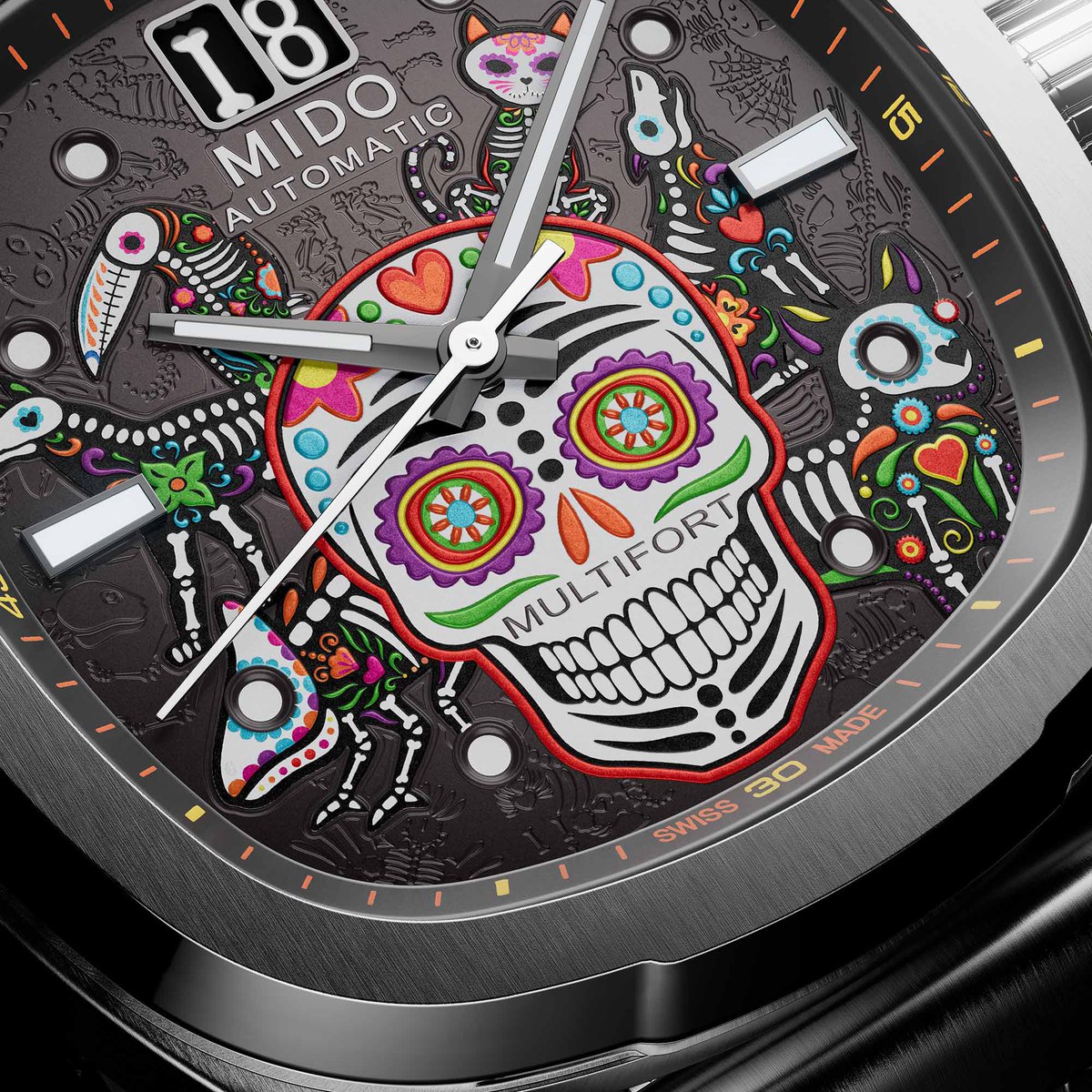 aBlogtoWatch's tweet photo. The new Multifort TV Big Date Día de los Muertos Alebrijes introduces its colorful calavera motif to the retro-inspired Multifort TV collection for the first time, bringing a distinctly Mexican character to one of the brand’s most recognizable contemporary designs.

Observed on November 1 and 2, Día de los Muertos, or Day of the Dead, is a Mexican holiday honoring deceased loved ones through colorful celebrations rooted in Indigenous and Catholic traditions. Families create ofrendas, or altars, decorated with photographs, marigolds, candles, and offerings to welcome the spirits of the departed. UNESCO recognized the tradition as Intangible Cultural Heritage in 2008.

The centerpiece of the Multifort TV Big Date Día de los Muertos Alebrijes is its elaborate gray-to-black gradient dial. A colorful calavera occupies the center of the composition, surrounded by fantastical animal figures inspired by Mexican alebrijes. Twelve different lacquers create the intricate multicolored artwork, while animal motifs engraved in negative relief introduce additional texture and depth with the addition of three colors of Swiss Super-LumiNova, taking on a different appearance in the dark. 

The oversized date display remains positioned at 12 o’clock, powered by Mido’s automatic Caliber 90 based on the ETA C07.651. Recessed luminous hour markers and diamond-cut, faceted hands provide the essential timekeeping indications. Even the date mechanism receives a thematic detail: the numeral 1 is shaped like a bone, carrying the Día de los Muertos inspiration into one of the watch’s defining mechanical features.

With its combination of traditional cultural imagery, vibrant dial decoration, and the contemporary Multifort TV case, the Día de los Muertos Alebrijes continues a tradition that has become a distinctive part of Mido’s annual collection.

Discover the Mido Multifort TV Big Date Día de los Muertos Alebrijes now on aBlogtoWatch.

#SponsoredPost