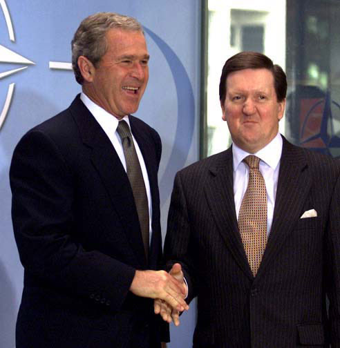 25YearsAgoLive's tweet photo. NATO Secretary General Lord Robertson announces that the United States will be invoking the Article V mutual defense clause in its fight against Osama Bin Laden. https://t.co/VNDfyxvdUQ