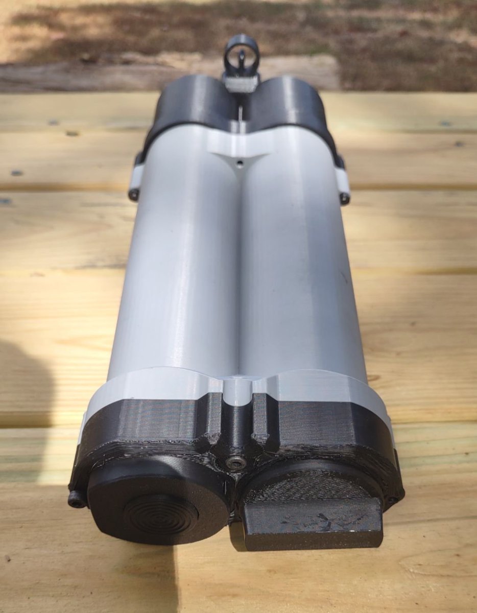 ModeratorGage's tweet photo. The Decker 9 beta has received a lot of love. We are continuing to work on this project and make it better everyday. How do we do that? We experiment! Now joining the lineup in the Decker 9 room is the double helical magazine we prepared for trouble and made it double. 128 round of 9mm for the discerning gentleman. This is still a prototype but it works.
