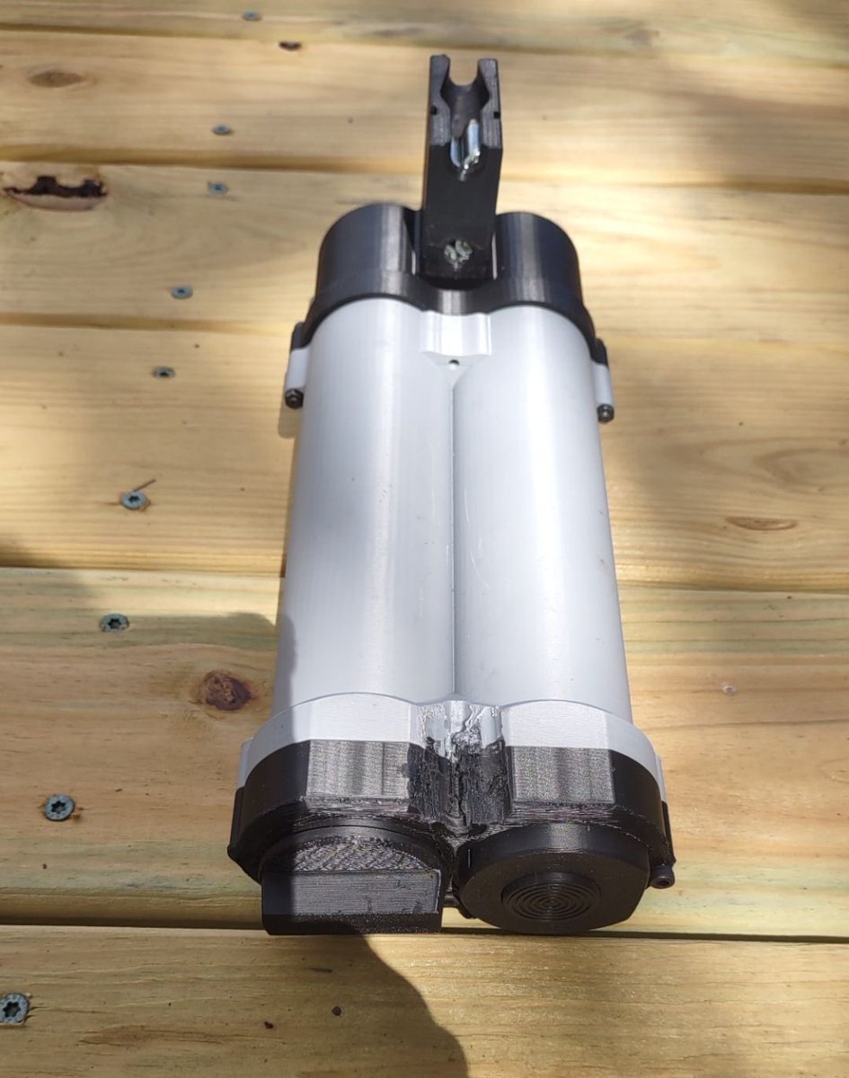 ModeratorGage's tweet photo. The Decker 9 beta has received a lot of love. We are continuing to work on this project and make it better everyday. How do we do that? We experiment! Now joining the lineup in the Decker 9 room is the double helical magazine we prepared for trouble and made it double. 128 round of 9mm for the discerning gentleman. This is still a prototype but it works.