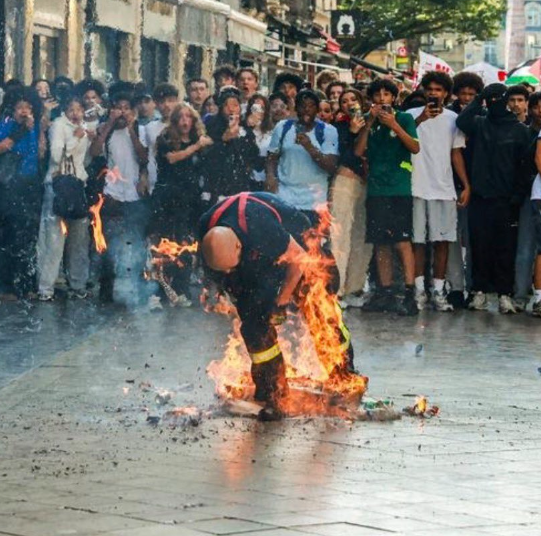TArchcast's tweet photo. This is such a poetic photo!

- The rescuer. Summoned to the scene of a fire, is set alight by the very people who set the fire! And will KEEP setting fires because, unlike the rescuers assumptions. The first was not an accident! https://t.co/Khj6c5bOKb