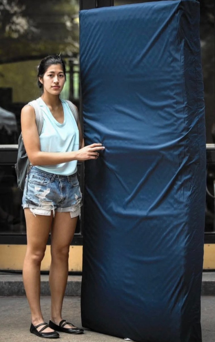 AzPetrich's tweet photo. Emma Silkowicz.

Raped college student, Columbia Univ.

Ignored by administration, dismissed her rape allegation and  allowed him to remain on campus.

Carried the mattress she was raped on around campus as silent protest.

Carried it to collect her diploma.

She was a sophomore. https://t.co/9zYQRuAhM2