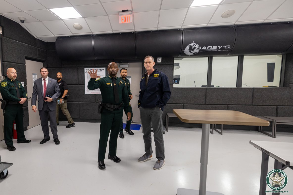 FBIMiamiFL's tweet photo. Strong partnerships make our communities safer. On Thursday, October 1, Special Agent in Charge Brett Skiles and Assistant Special Agent in Charge Christopher Caldwell met with Broward Sheriff Dr. Gregory Tony at the Research, Development and Training Center to strengthen our partnership and discuss the importance of fitness and wellness for law enforcement professionals. It was an honor to visit the center and reaffirm our shared commitment to collaboration, training, and service.
