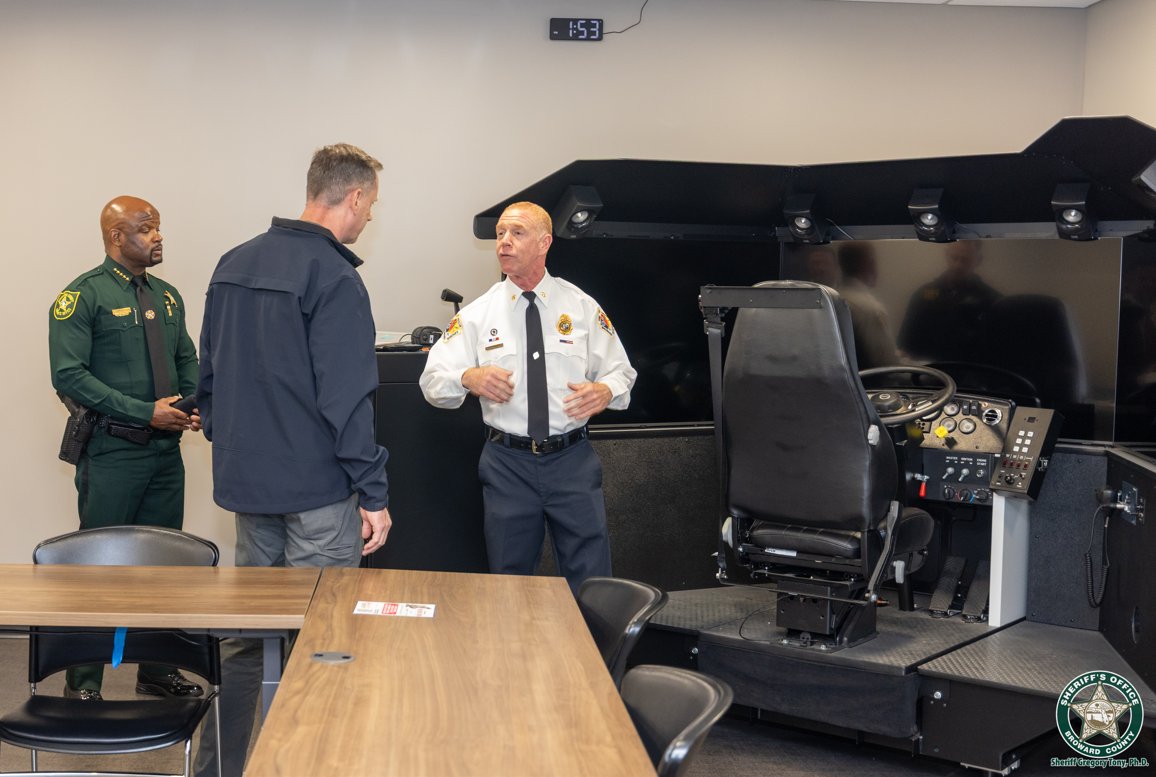 FBIMiamiFL's tweet photo. Strong partnerships make our communities safer. On Thursday, October 1, Special Agent in Charge Brett Skiles and Assistant Special Agent in Charge Christopher Caldwell met with Broward Sheriff Dr. Gregory Tony at the Research, Development and Training Center to strengthen our partnership and discuss the importance of fitness and wellness for law enforcement professionals. It was an honor to visit the center and reaffirm our shared commitment to collaboration, training, and service.